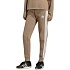 Dámske nohavice adidas Essentials 3-Stripes Fleece Slim, béžové, KF8317